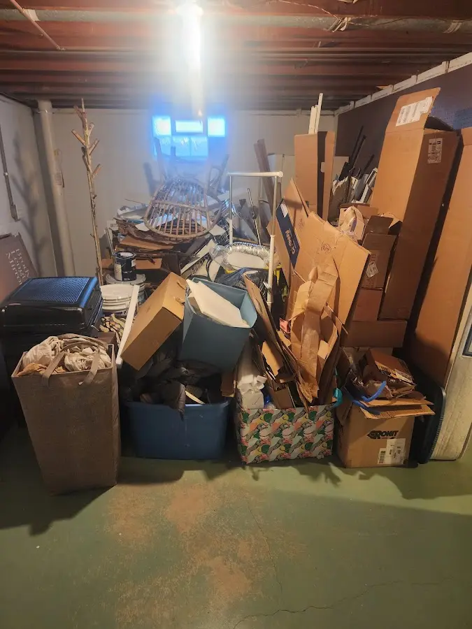 Roll-off dumpster container at job site for 2 Yard Dumpster Rental in Saratoga Springs